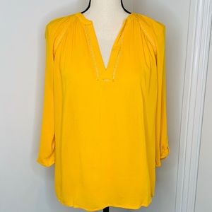 Deep V neck flutter sleeve top